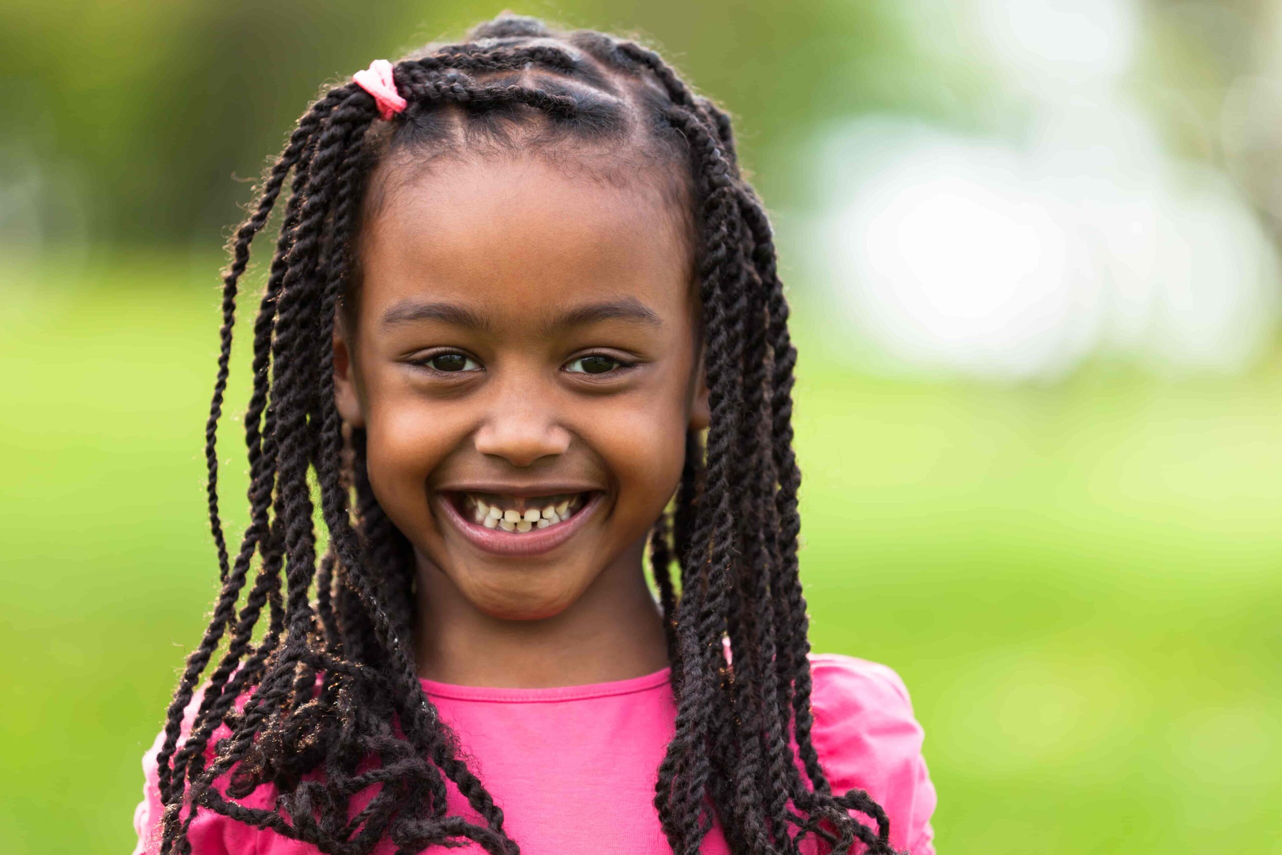picture of a little girl with braids for post on middle names for zuri