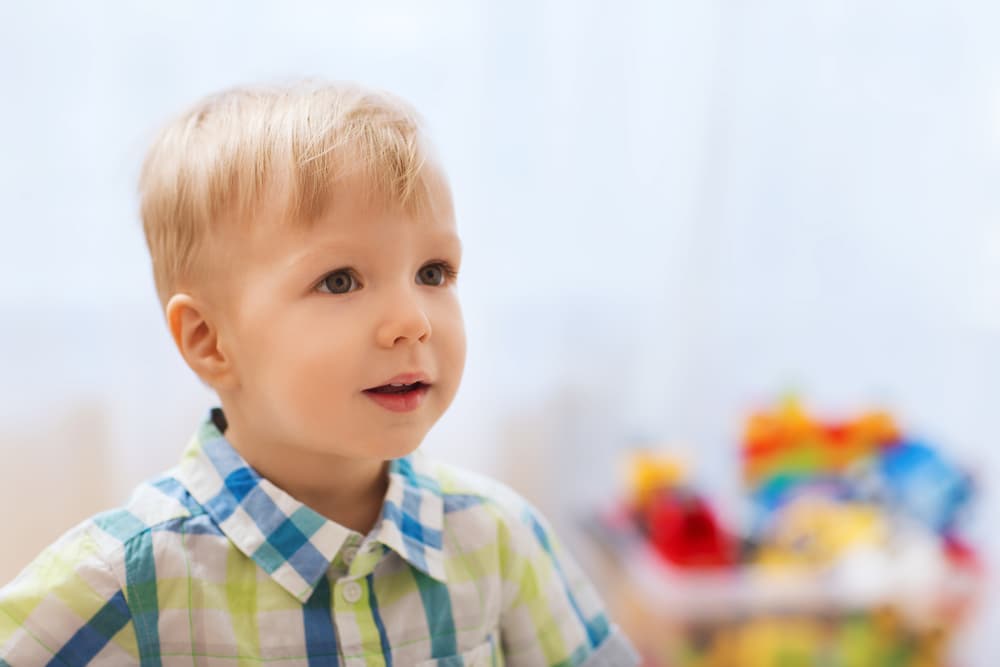 picture of toddler boy in button up shirt